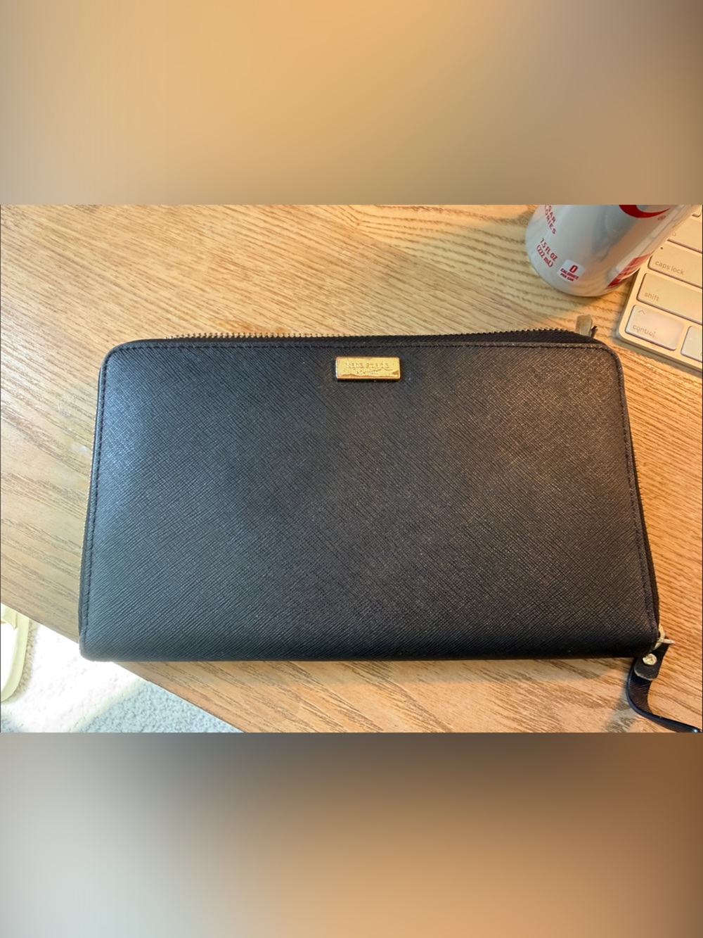 kate spade black zip-around saffiano leather wallet